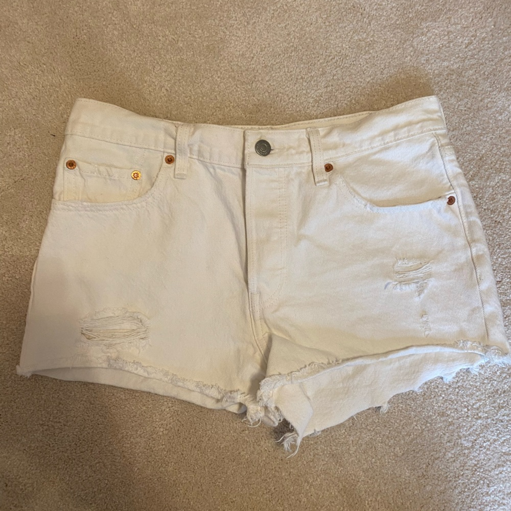 Levi’s | 501 white distressed denim shorts